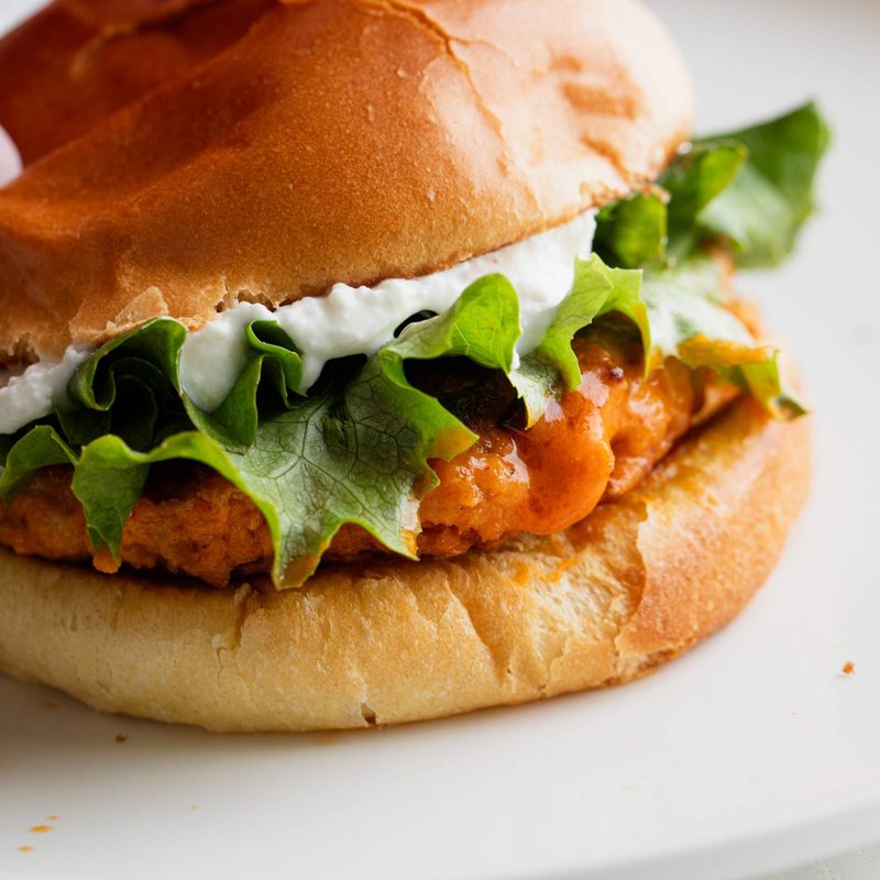 A picture of Buffalo Chicken Burgers with Whipped Feta Spread