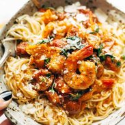 Garlic Butter Capellini Pomodoro with Shrimp in bowl.