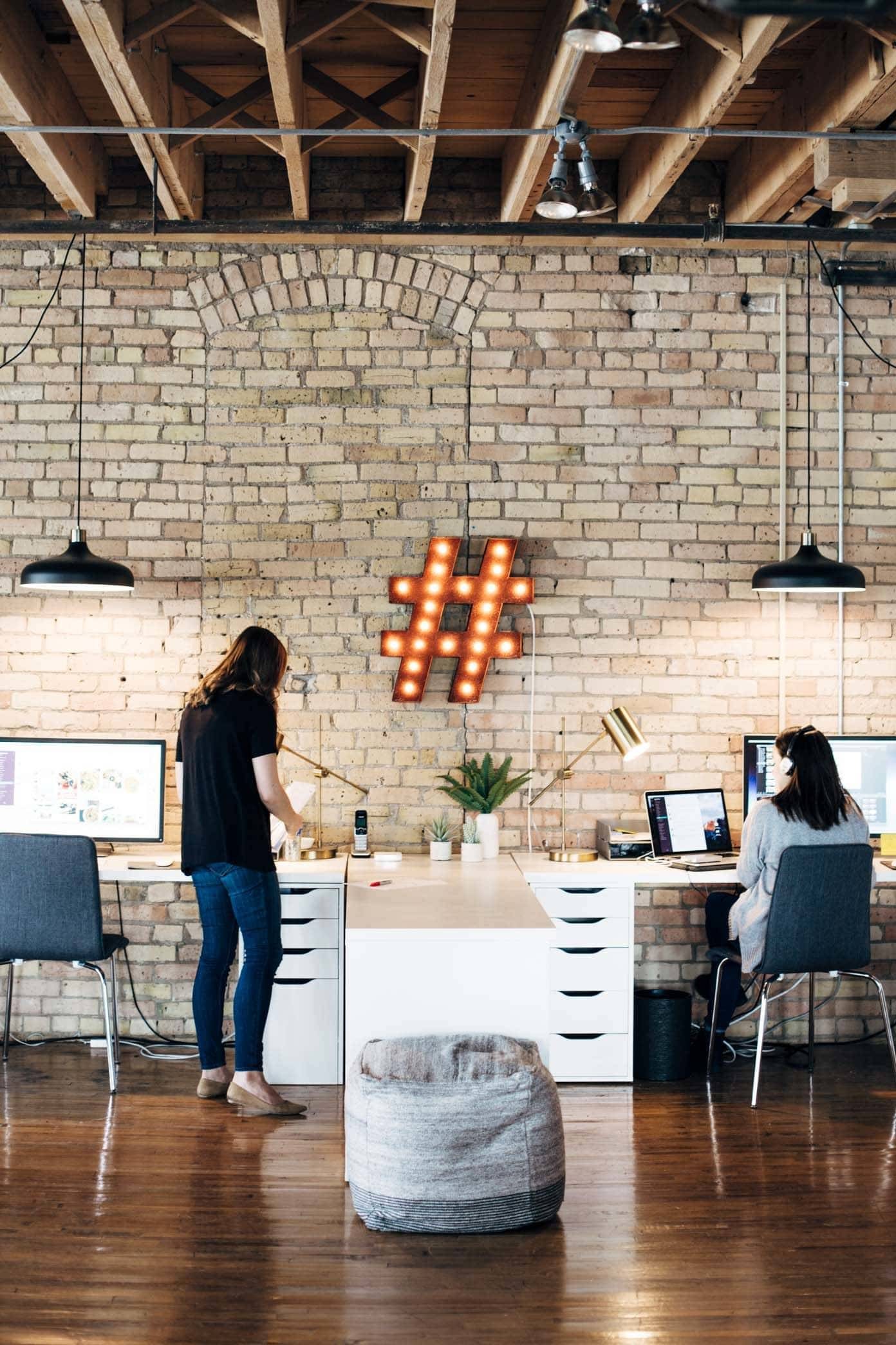 Two women working in an office.